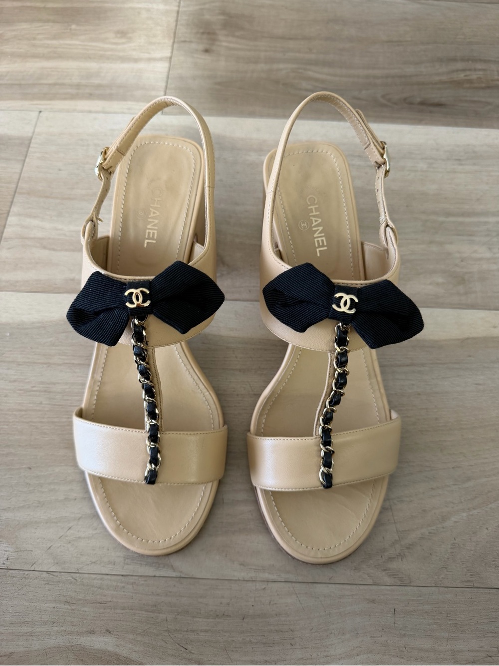 CHANEL Beige Slingback Sandals with Black Bow and Gold CC